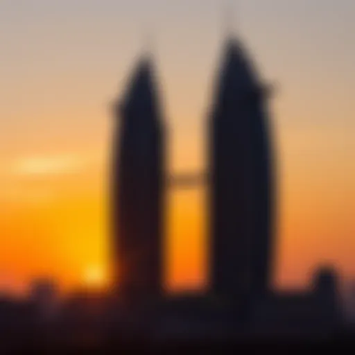 Panoramic view of Etihad Towers at sunset, showcasing their majestic silhouette against the sky.