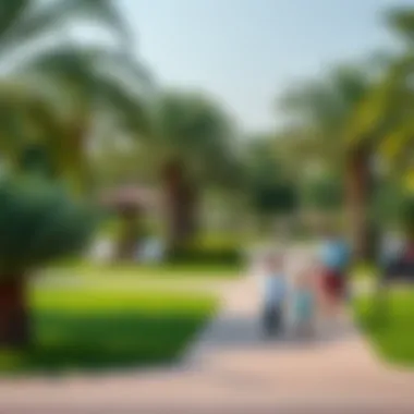A local park in Al Wasl filled with greenery and families enjoying leisure time, highlighting community amenities.