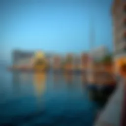 A serene view of Dubai Creek showcasing waterfront properties.