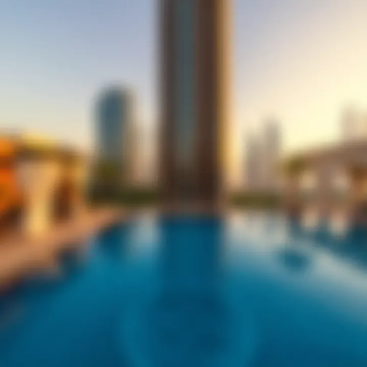 Poolside view with a skyline backdrop at Pullman Jumeirah Lakes Towers